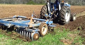 Ford 6610 disking plowing