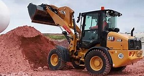 908 High Lift with Bucket at Work | Next Generation Cat® Compact Wheel Loaders