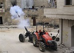 Photographs show Free Syrian Army fighters firing home-made rockets ...
