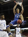 Mason Plumlee of Duke dunks while Kentucky's Nerlens Noel looks on ...