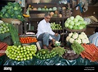 A man selling vegetables at Crawford Market in Mumbai India Stock Photo ...