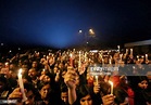 Protestors participate in a candle light vigil during a protest... News ...