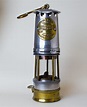a photo of a steel lamp with glass chamber and brass base | Lamp ...