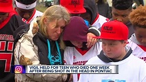 Vigil held for 14-year-old shot in the head
