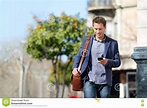 Business Man Using Mobile Phone Walking To Work Stock Image - Image of ...