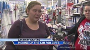 Secret Santas Pay Off Layaways Across the Country - YouTube
