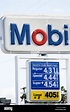 A Mobile gas station sign showing the price of gas in Fullerton ...
