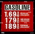 Gasoline Prices on Sign Stock Photo - Alamy