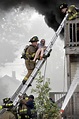 Neighbors, firefighters help rescue man from burning balcony