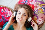 Woman listening to music - Stock Image - C031/4071 - Science Photo Library