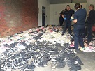 Thousands of allegedly stolen shoes found by police at Kilsyth home ...
