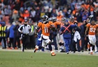 Wide receiver Trindon Holliday runs the opening kickoff for a touchdown ...