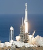 SpaceX's big new rocket blasts off, puts sports car in space