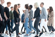 In Full Growth. Diverse Young People Walk Past Each Other Stock Photo ...
