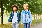 Premium Photo | Two boys walking outdoors