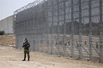 Israel announces completion of security barrier around Gaza | AP News