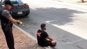Video Shows Police Officer Firing Stun Gun at Unarmed Man Sitting on ...