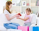 Mother giving a gift for her daughter — Stock Photo © valuavitaly #3664991