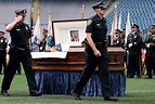 Police dog killed in shootout honored with open casket funeral at ...