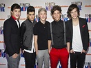 Boy band One Direction makes chart history - CBS News