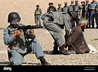 Afghan national policemen demonstrate their tactical maneuvers at the ...