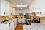 Say "Hi!" to a Classic White Kitchen with Unique Cabinets from GEC