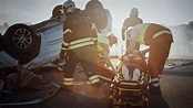 On the Car Crash Traffic Accident Scene: Rescue Team of Firefighters ...