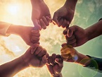 Business group with hands together, teamwork concepts - Horizon Foundation