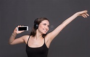 Woman Listen To Music in Earphones, Studio Shot Stock Image - Image of ...