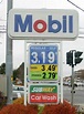 A sign showing gas prices at a Mobil gas station in... 443173 - NewsTimes