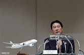 Yoshiharu Ueki, president of Japan Airlines Co. , speaks during a ...