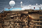 A damaged side section of the capsized cruise liner Costa Concordia is ...