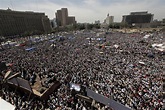 Egyptian protestors attend Friday prayers during a rally in Tahrir ...