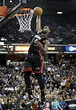 Miami Heat forward LeBron James dunks after a breakaway against the ...