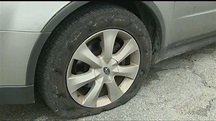 Dozens of car tires slashed