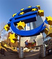 Euro Symbol in Front of the European Central Bank with Occupy Ca ...