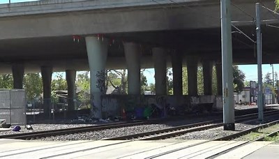 Homeless camp near Sacramento train tracks forces freight trains to stop