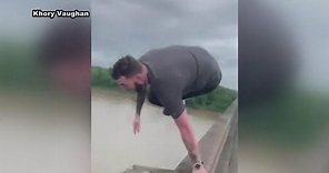 Viral video shows man jump from I-10 bridge during gridlock