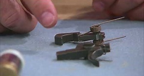 How to Install an AR-15 Hammer & Trigger Assembly Presented by Larry Potterfield of MidwayUSA
