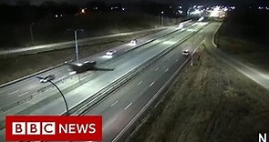 Plane makes emergency landing on US highway - BBC News