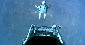 Felix Baumgartner makes record-breaking skydive from space – video