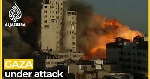 Israel bombards government buildings in Gaza amid ground raids