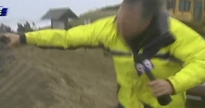 Reporters hang on for dear life in Hurricane Sandy