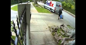 FedEx Driver Tossing Computer Monitor Over Fence Official Viral Video