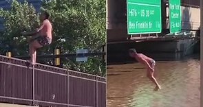 WATCH: Man backflips into floodwaters on Philadelphia highway