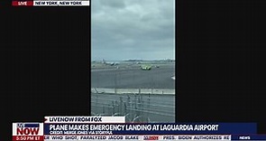 Plane makes emergency landing at New York s LaGuardia Airport due to unruly passenger